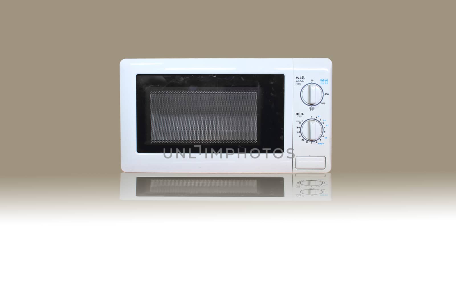 Old Microwave oven on gray and white background