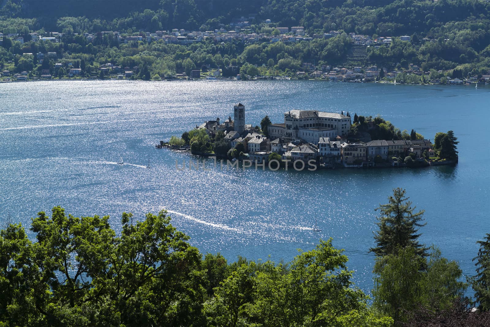 Lake Orta and San Giulio Island and reflection on the water, Piedmont - Italy