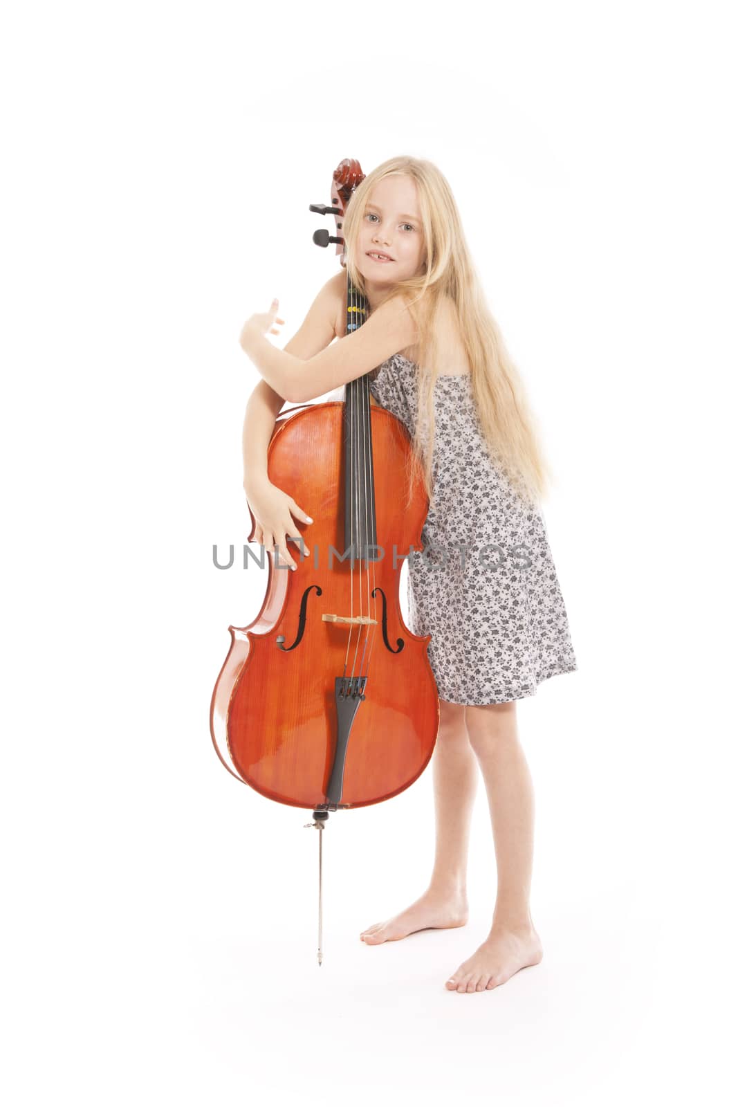 young girl in dress embracing her cello by ahavelaar