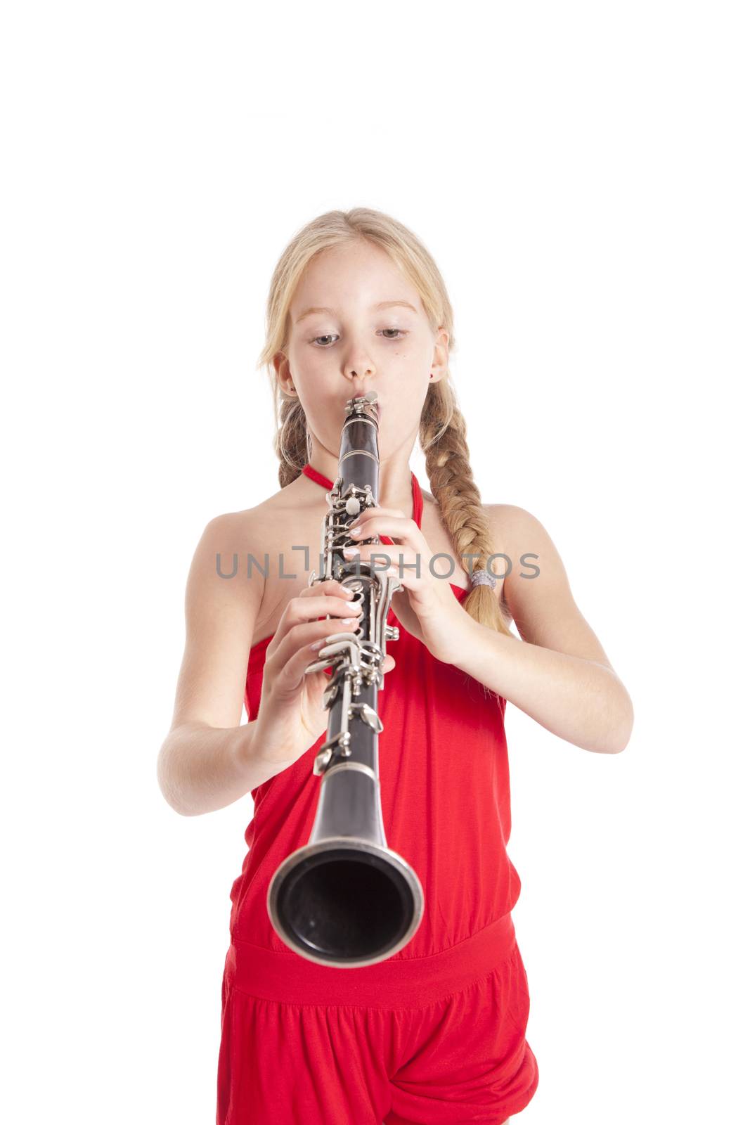 young girl in red playing clarinet by ahavelaar
