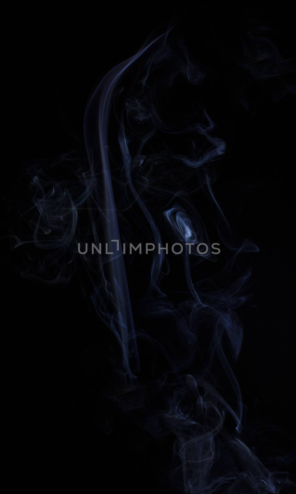 Abstract colored smoke closeup shot as the backdrop for the holidays