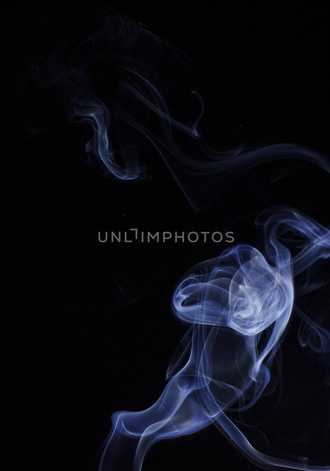 Abstract colored smoke closeup shot as the backdrop for the holidays