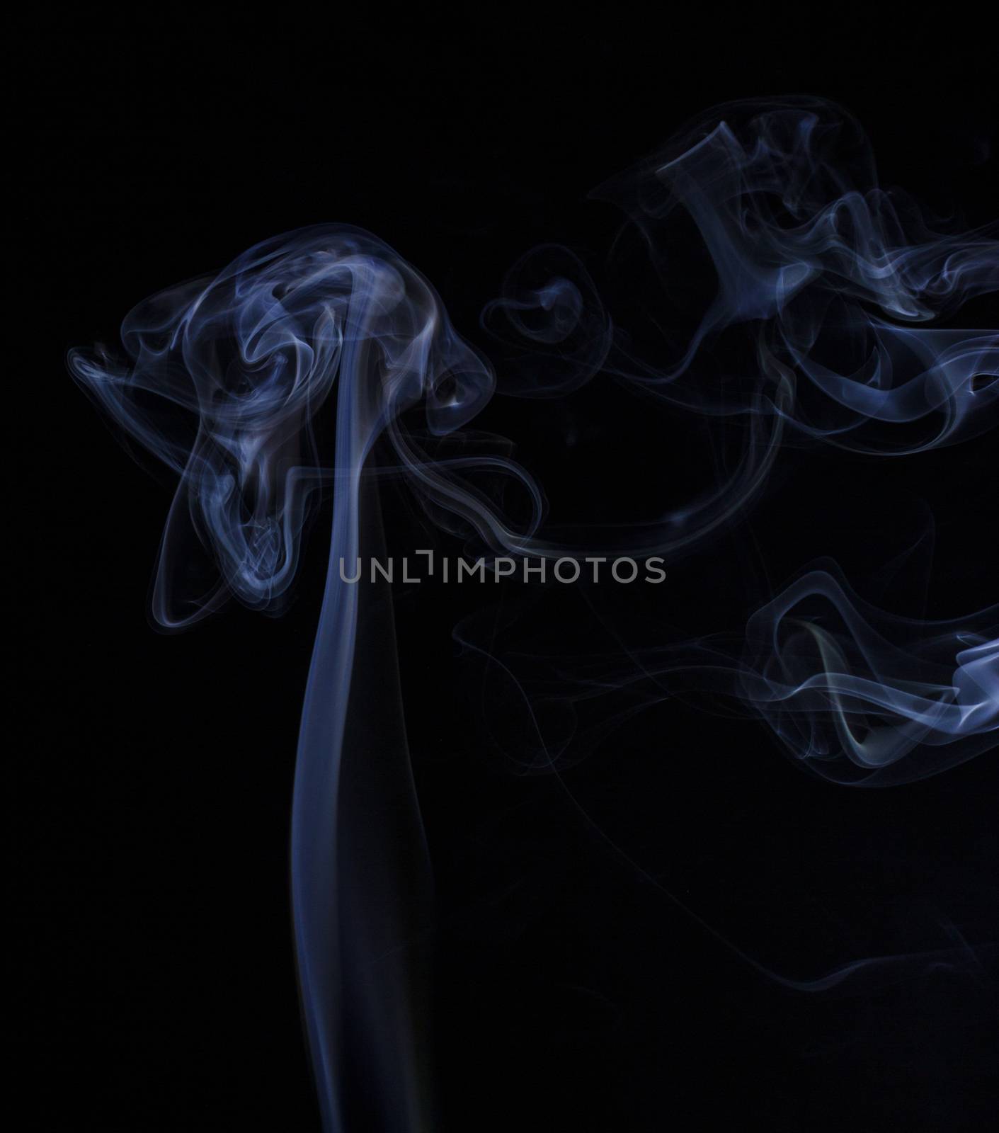 Abstract colored smoke closeup shot as the backdrop for the holidays