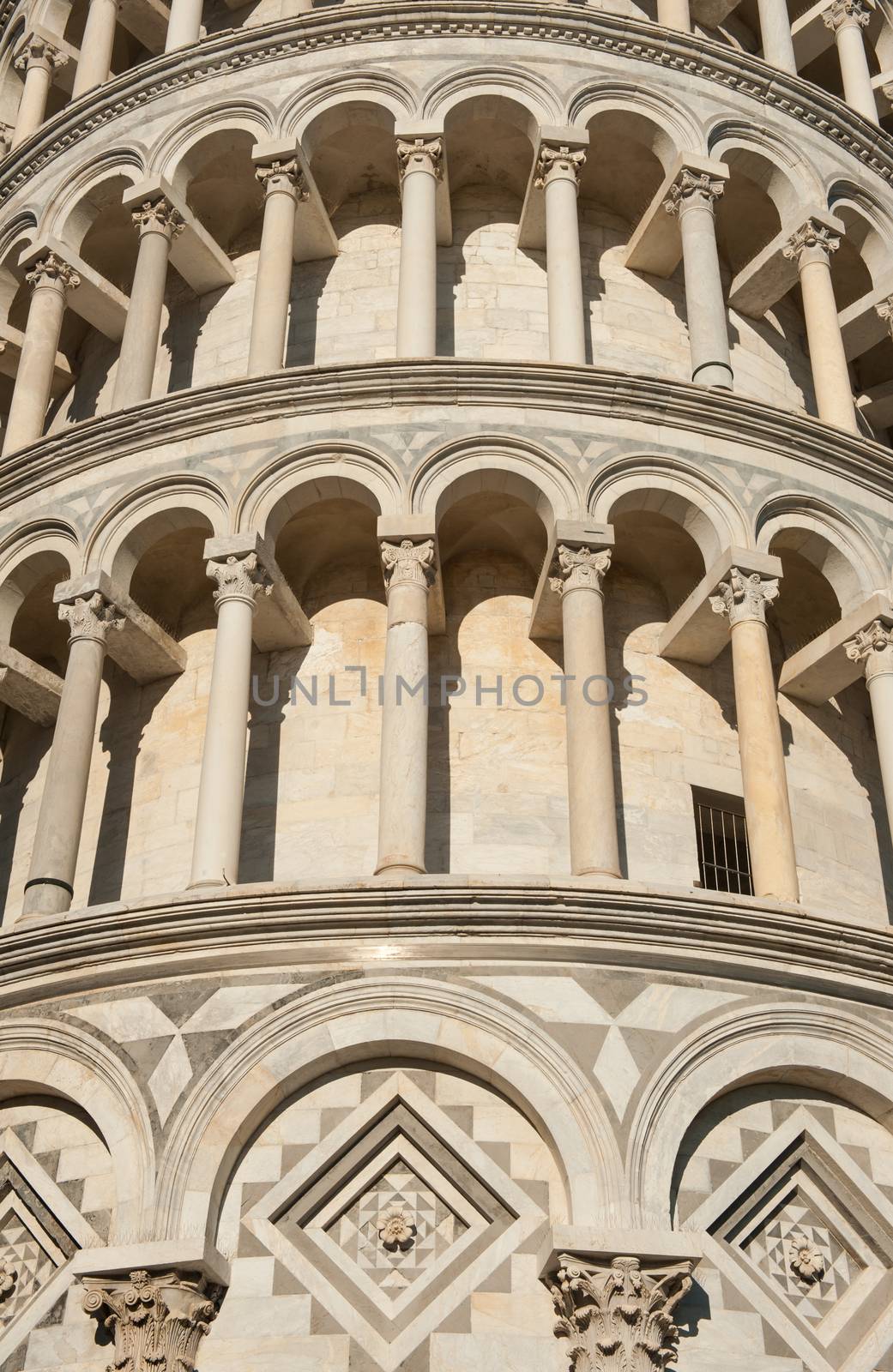 Detail of the Pisa leaning tower with detail on pillars