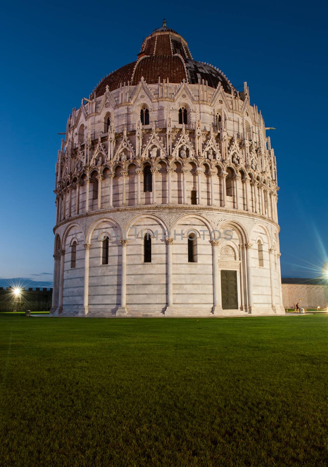 The Baptistery of the Cathedral in Pisa at night, Italy 