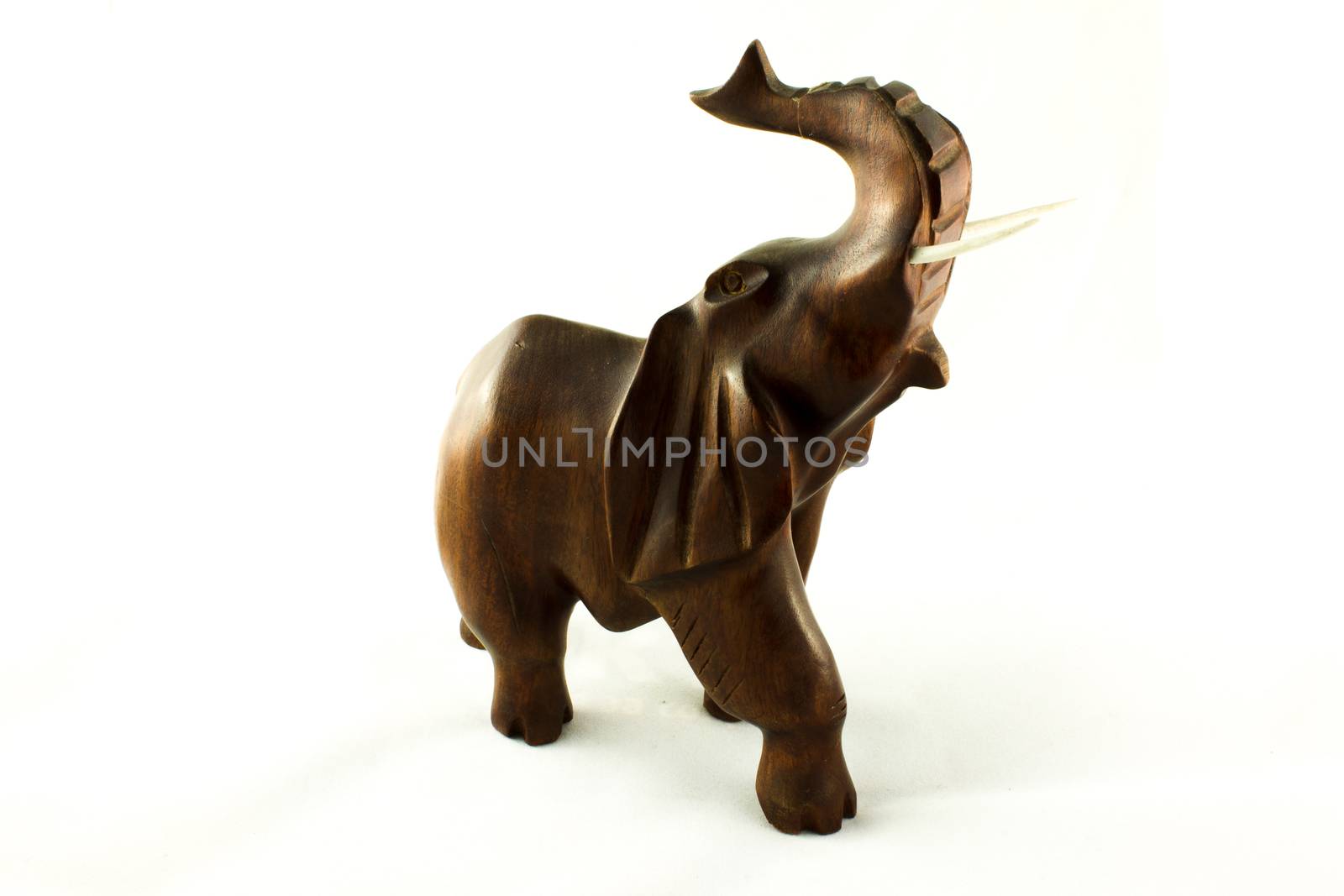 figure wooden elephant on white background