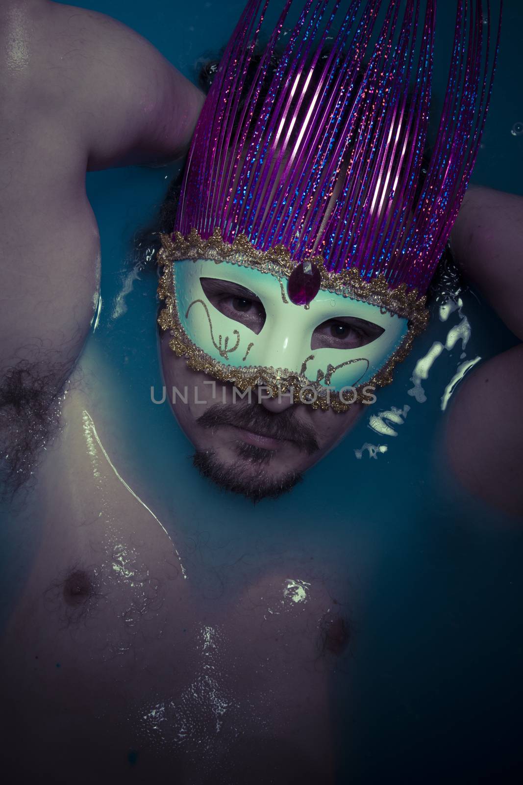 Depression, man in blue tub full of water, sadness concept by FernandoCortes