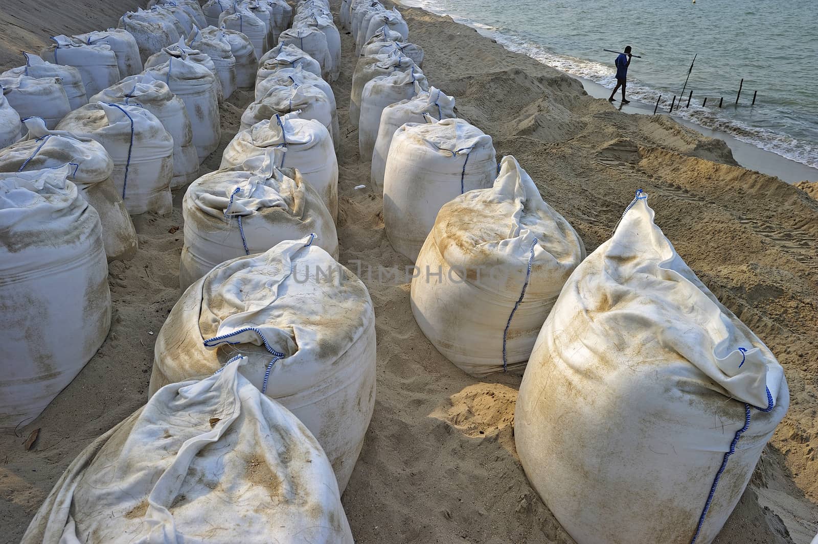 Sand bags along the beach in South of Thailand to protect from heavy surf and erosion.