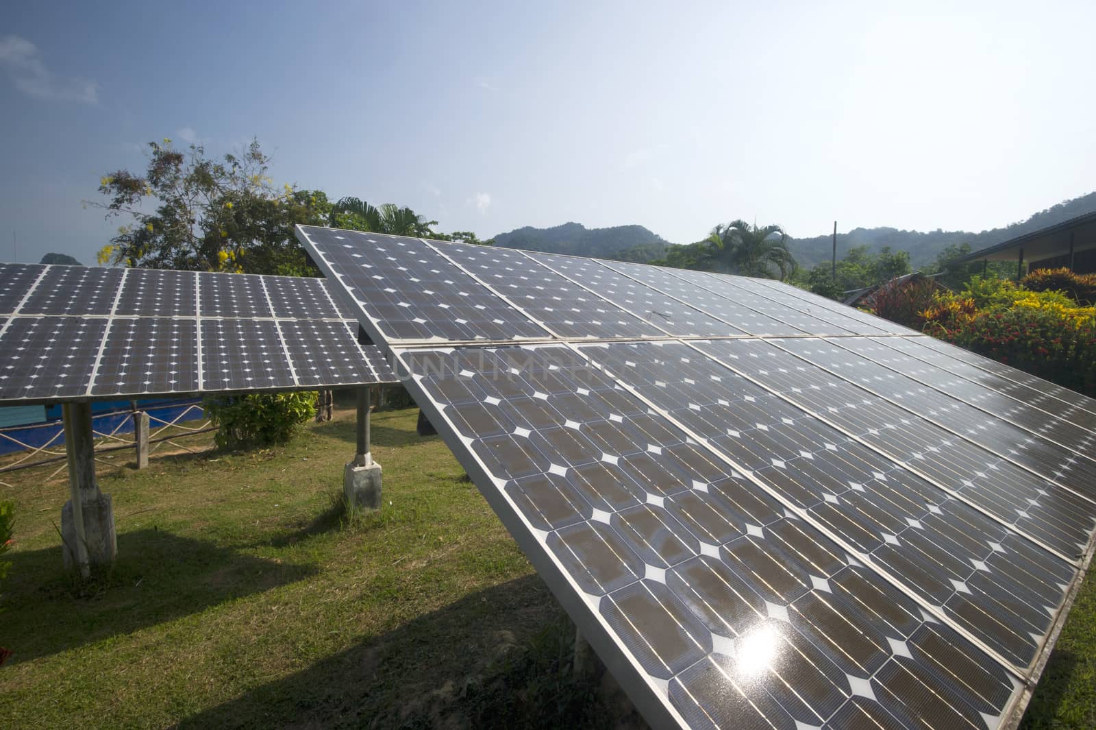 solar panel providing power to a rural area in thailand by think4photop