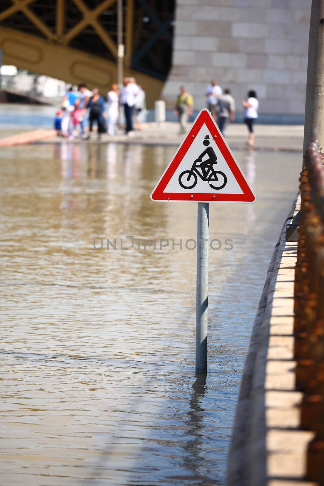 Flooded street n Budapest with traffic sign