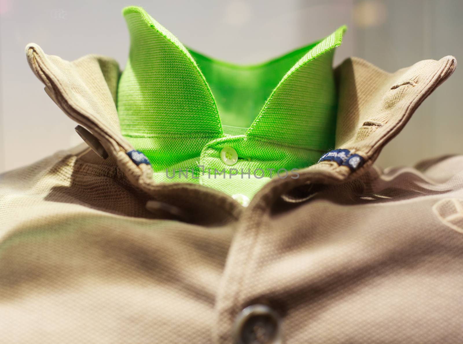 Close up of green and beige sweater