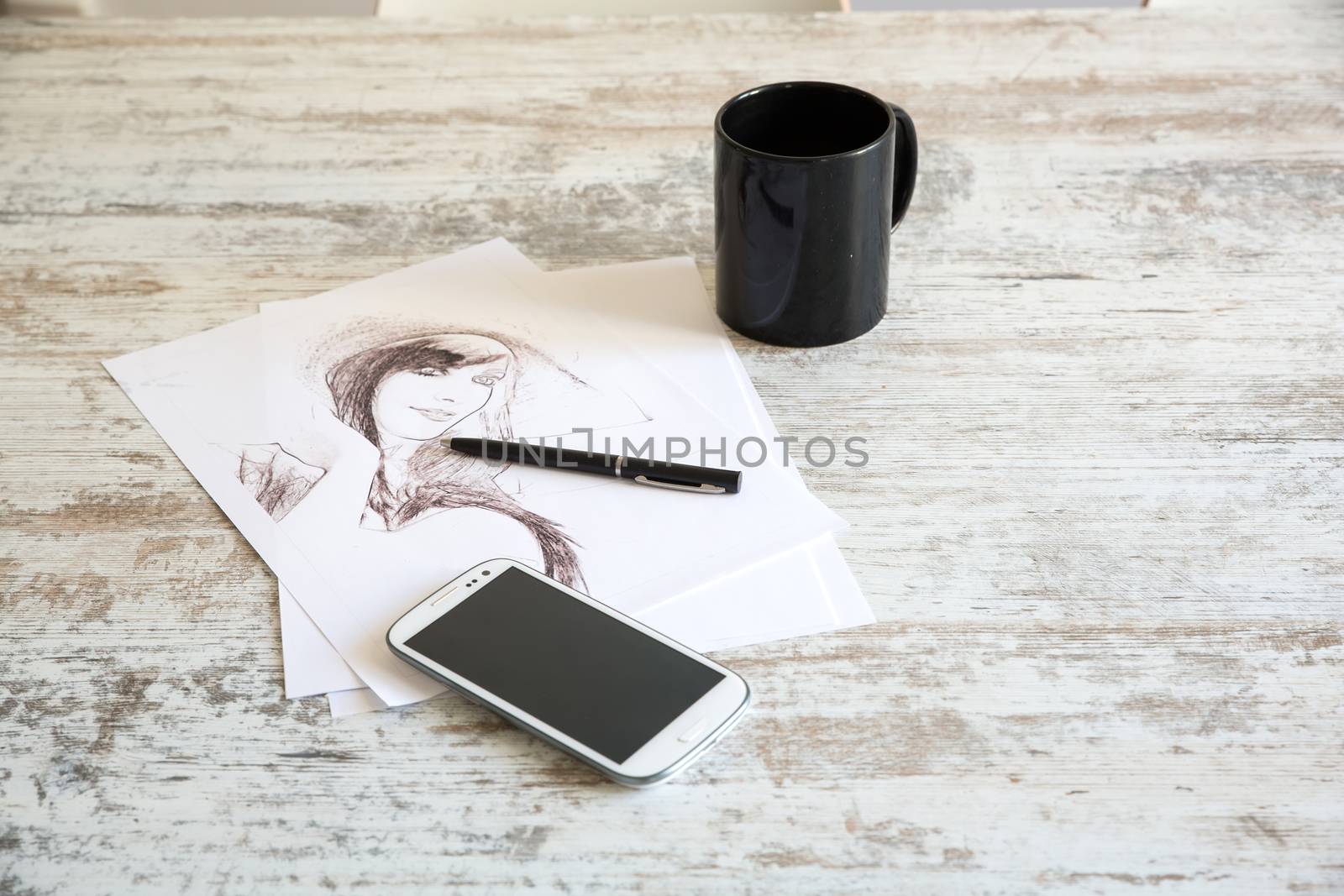 Drawing a sketch on the Table.