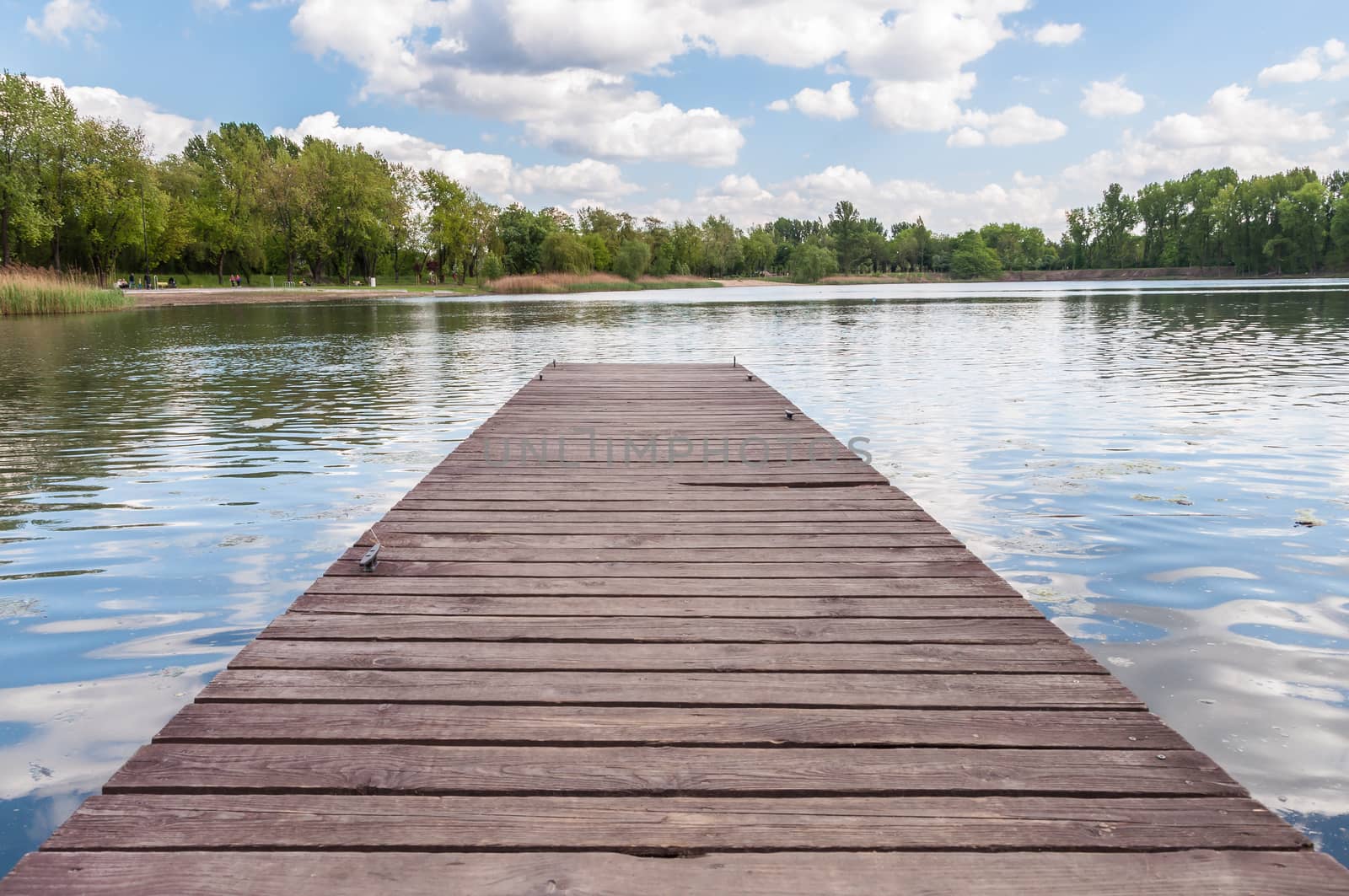 Old wooden jetty at a lake in Sosnowiec, Poland