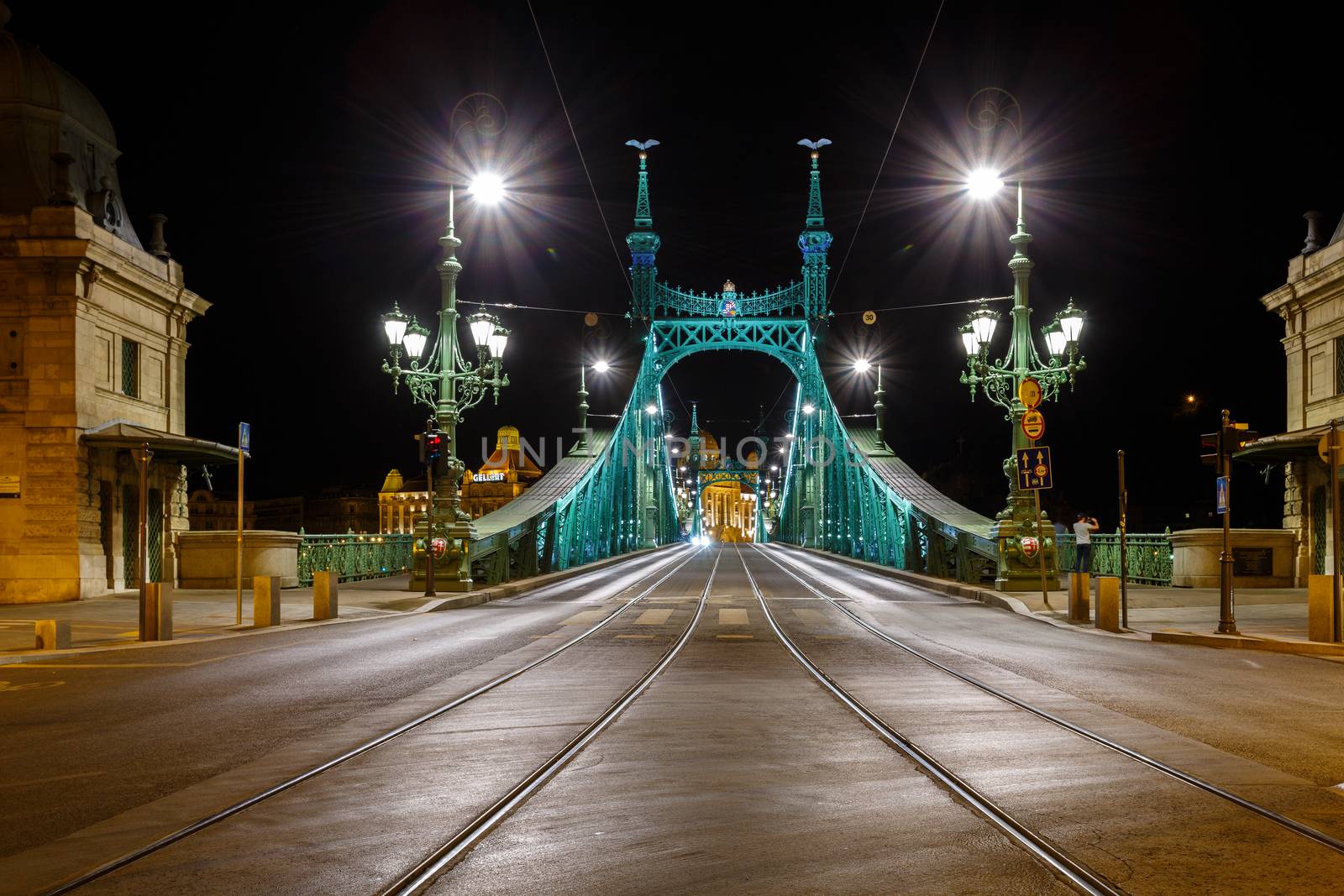 The Freedom bridge in Budapest Hungary by night.