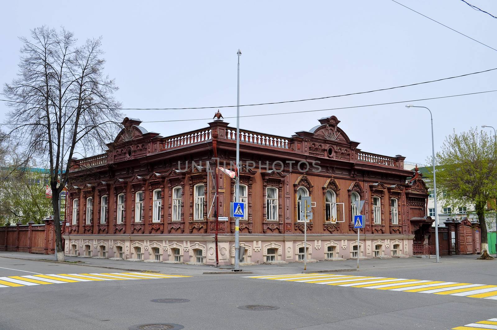 "Burkov's house" is a noticeable architectural and historical monument of Tyumen. Is on the former Sadovaya Street � nowadays to Dzerzhinsky Street. The house constructed by one of the richest people of Tyumen, the merchant of the first guild Vasily Petrovich Burkov is similar to the small palace. The decor of facades of the house unites in itself lines of stone and national wooden architecture. On a sample of stone mansions the front stairs and a main entrance are turned on the street. And here various types of carved platbands and other wooden elements of the building reflect specifics of a decor of wooden buildings.

In 1905 Burkov allocated the first floor of the house for placement of legal club "Union of Workers of Tyumen". The millionaire and the shipowner Ivan Ignatov gave to club the richest library. In club passed discussion of the questions connected with professional affairs of workers, self-education and cultural life of the city. By 1906 the club became the real power, and ideas of the Bolshevism here began to get. For this reason club closed, and Bolsheviks went underground.

Address: Tyumen, Dzerzhinsky St., 30