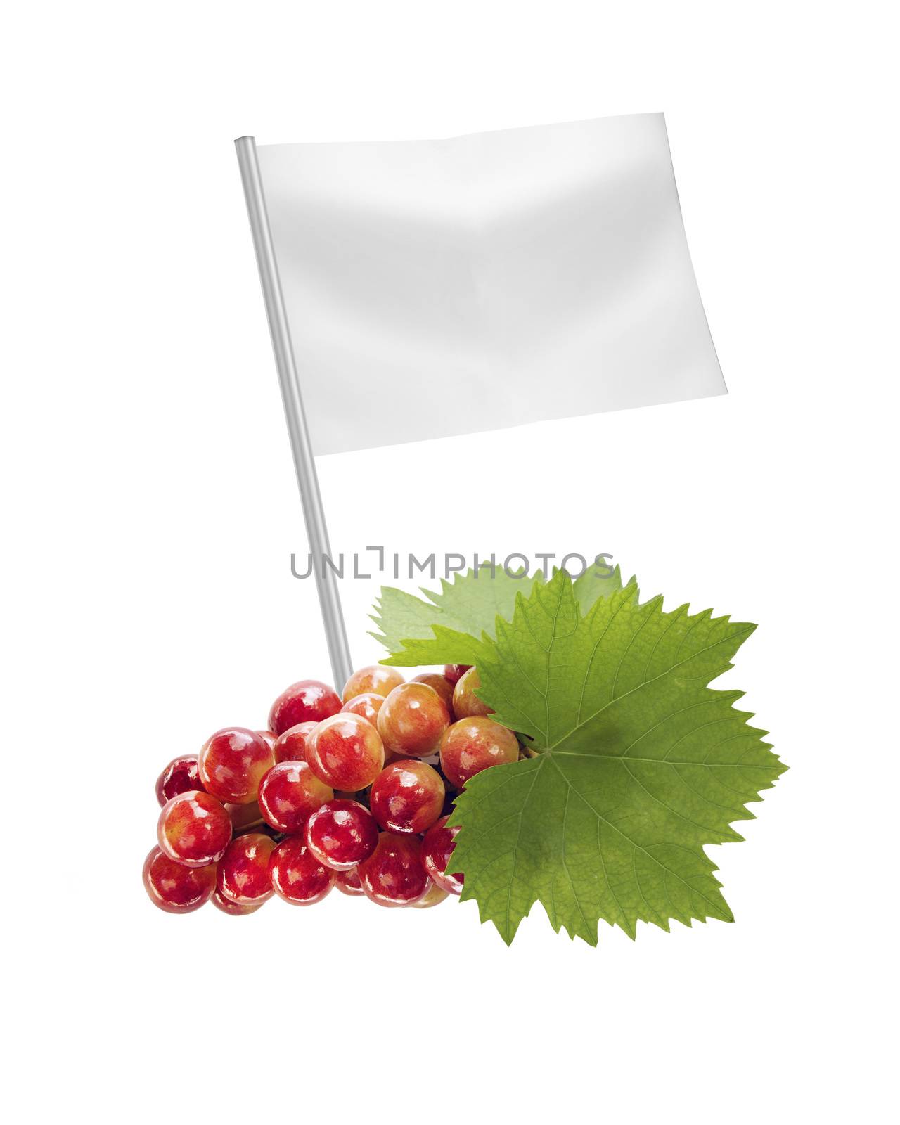 Healthy and organic food concept. Fresh red Ripe grapes with leaf with flag showing the benefits or the price of fruits.