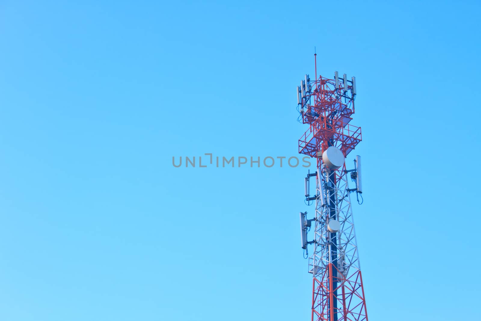 Telecommunications antenna for radio, television and telephony whit cloud and Blue sky 