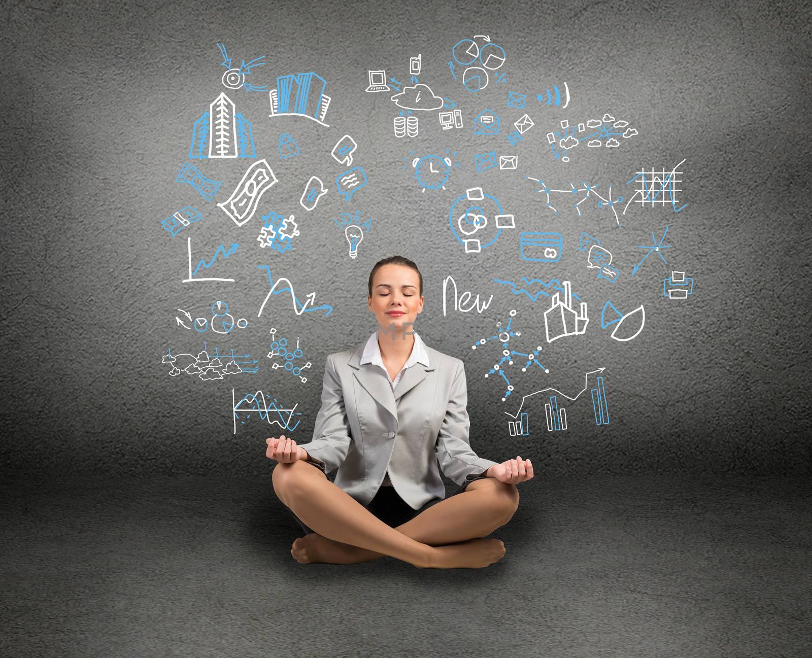 business woman meditating on floor, wall charts and diagrams are drawn