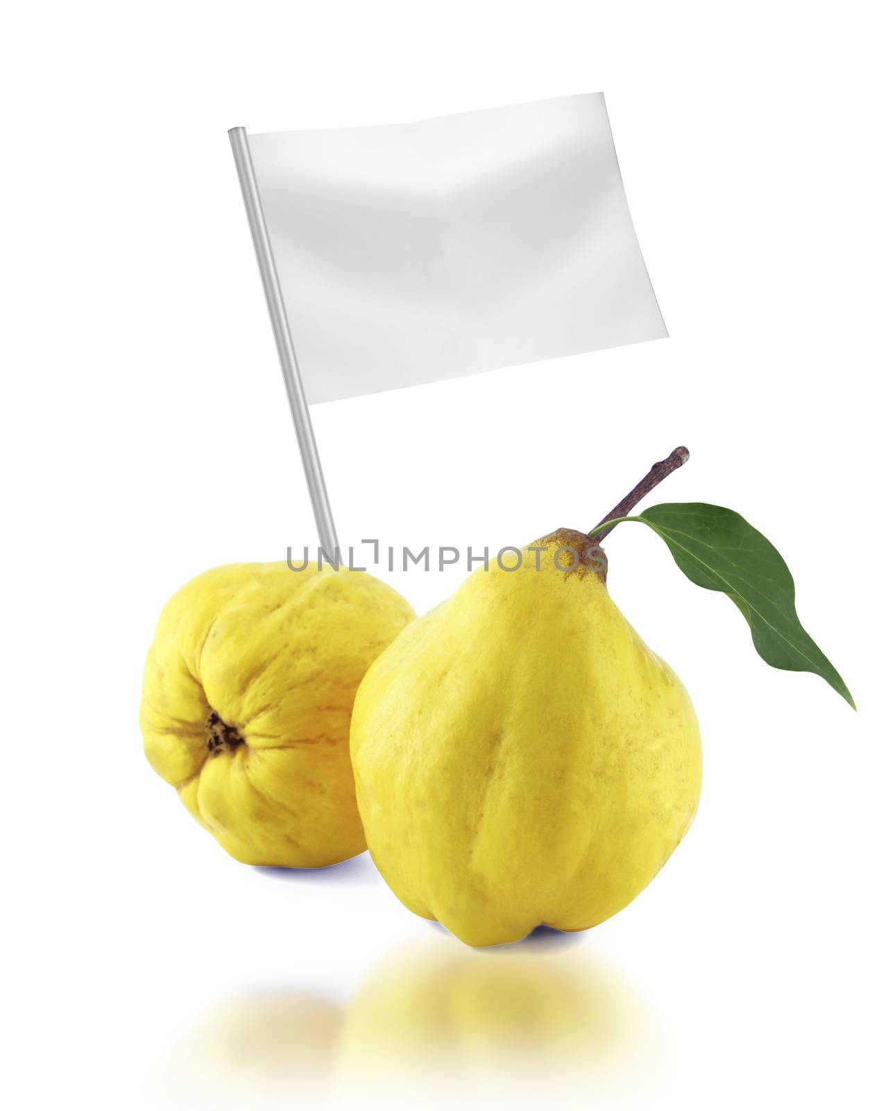 Healthy and organic food concept. Fresh sweet quinces with flag showing the benefits or the price of fruits.