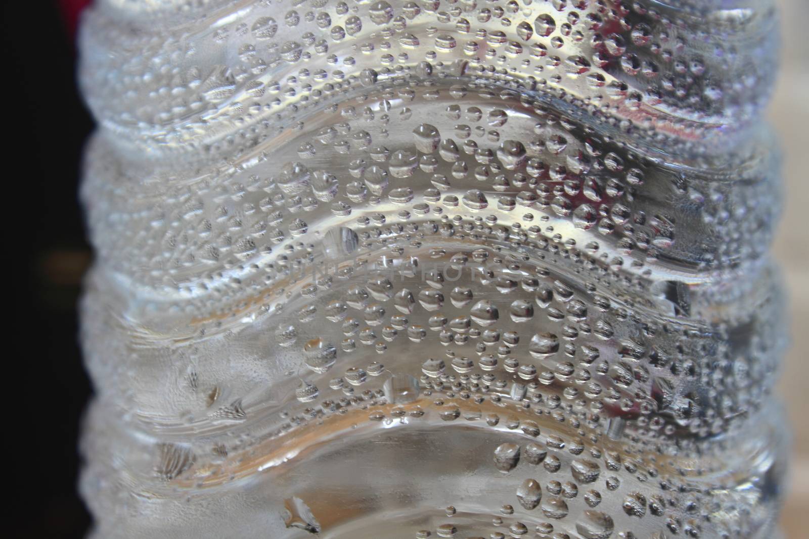 Water Drops on plastic bottle, background and texture