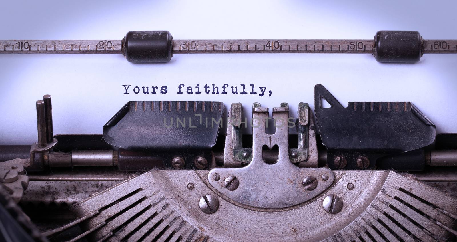 Vintage inscription made by old typewriter, yours faithfully