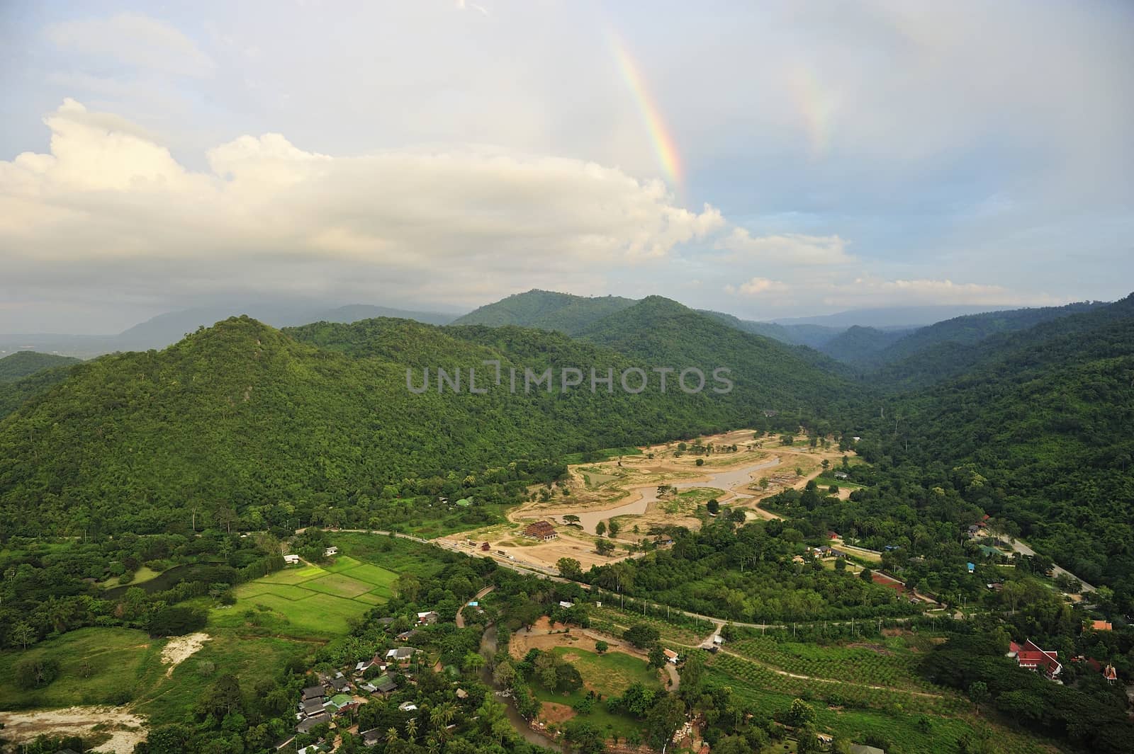 forest destruction with rainbow in thailand form Aerial view