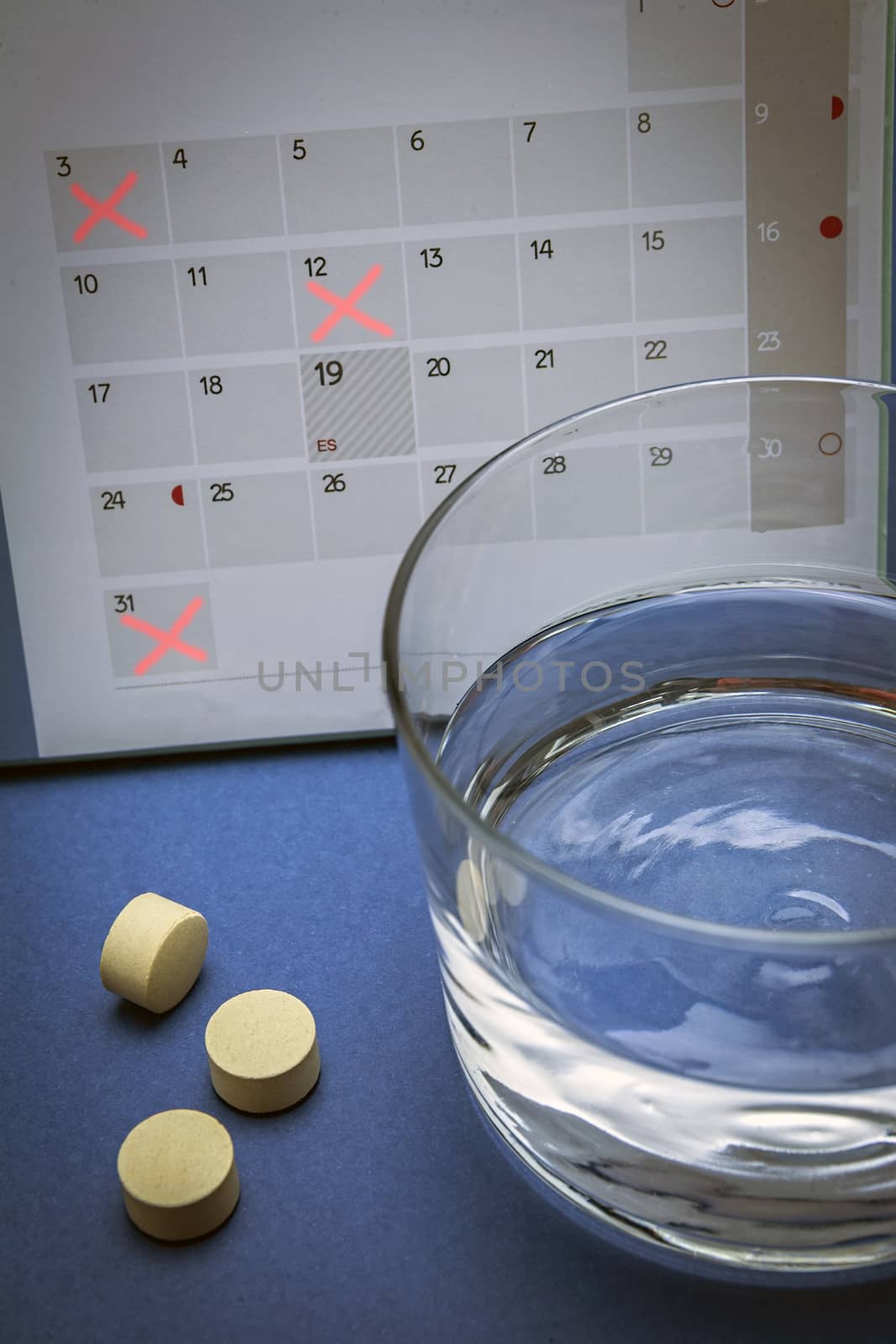 control pills on a calendar 