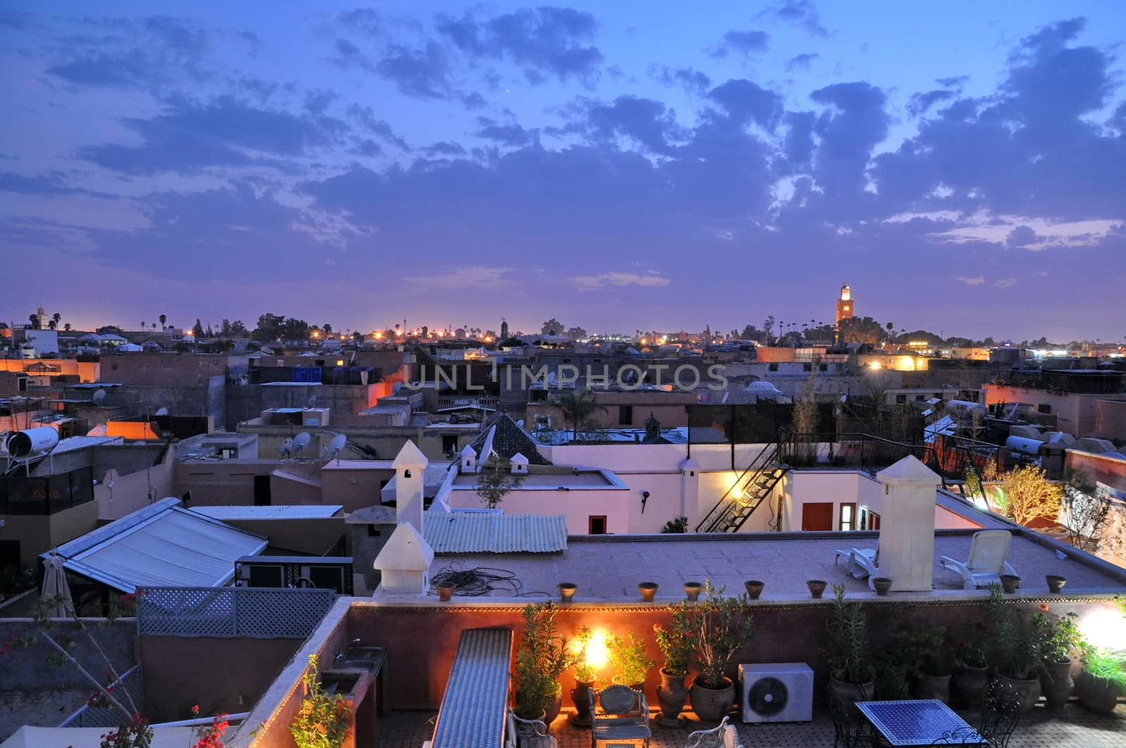 Marrakech rooftops at dusk by anderm