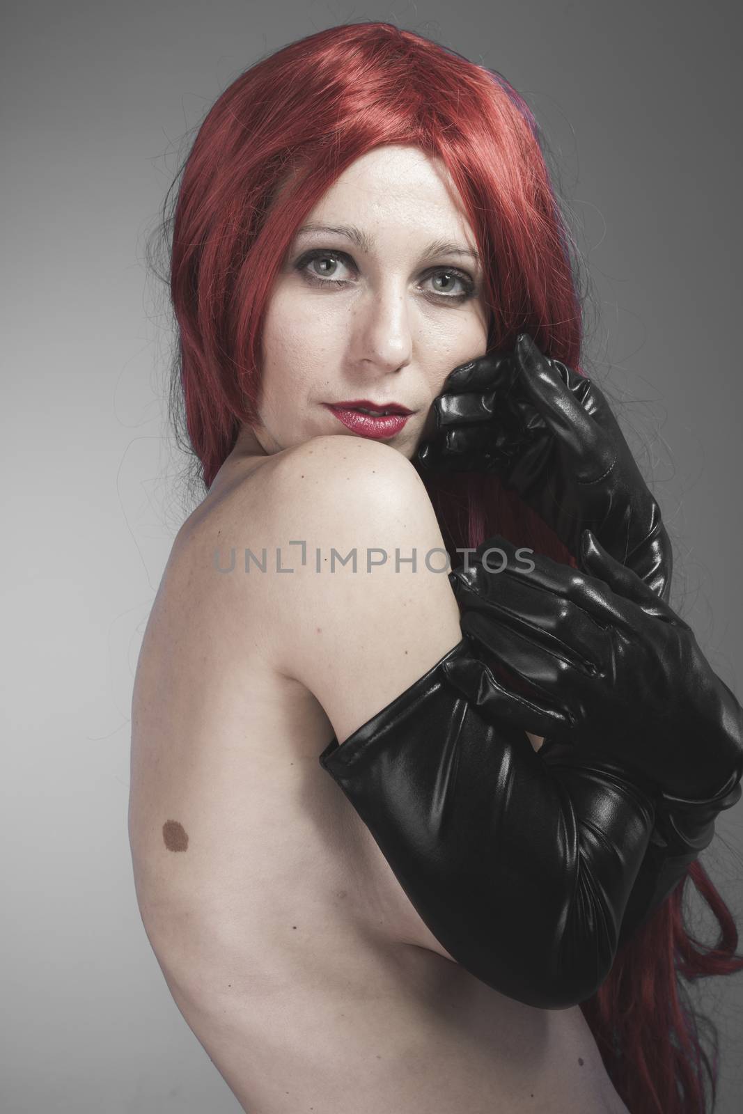 Female, redhead woman with black latex gloves, bare