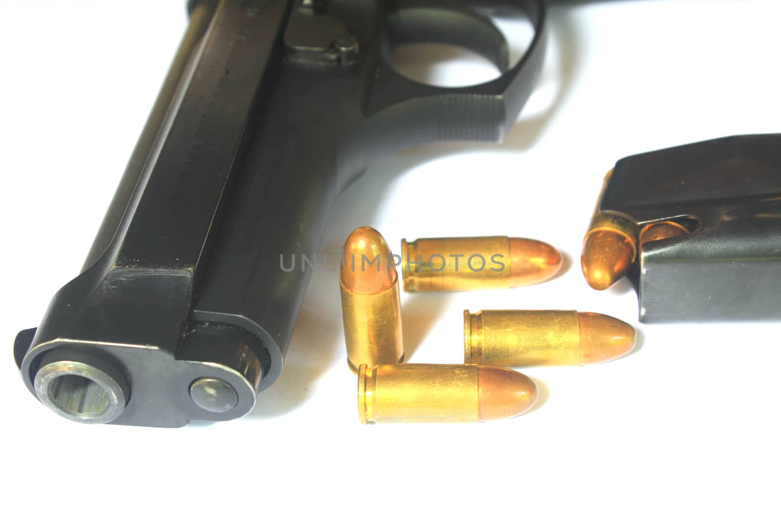 close up Gun with ammunition on white background