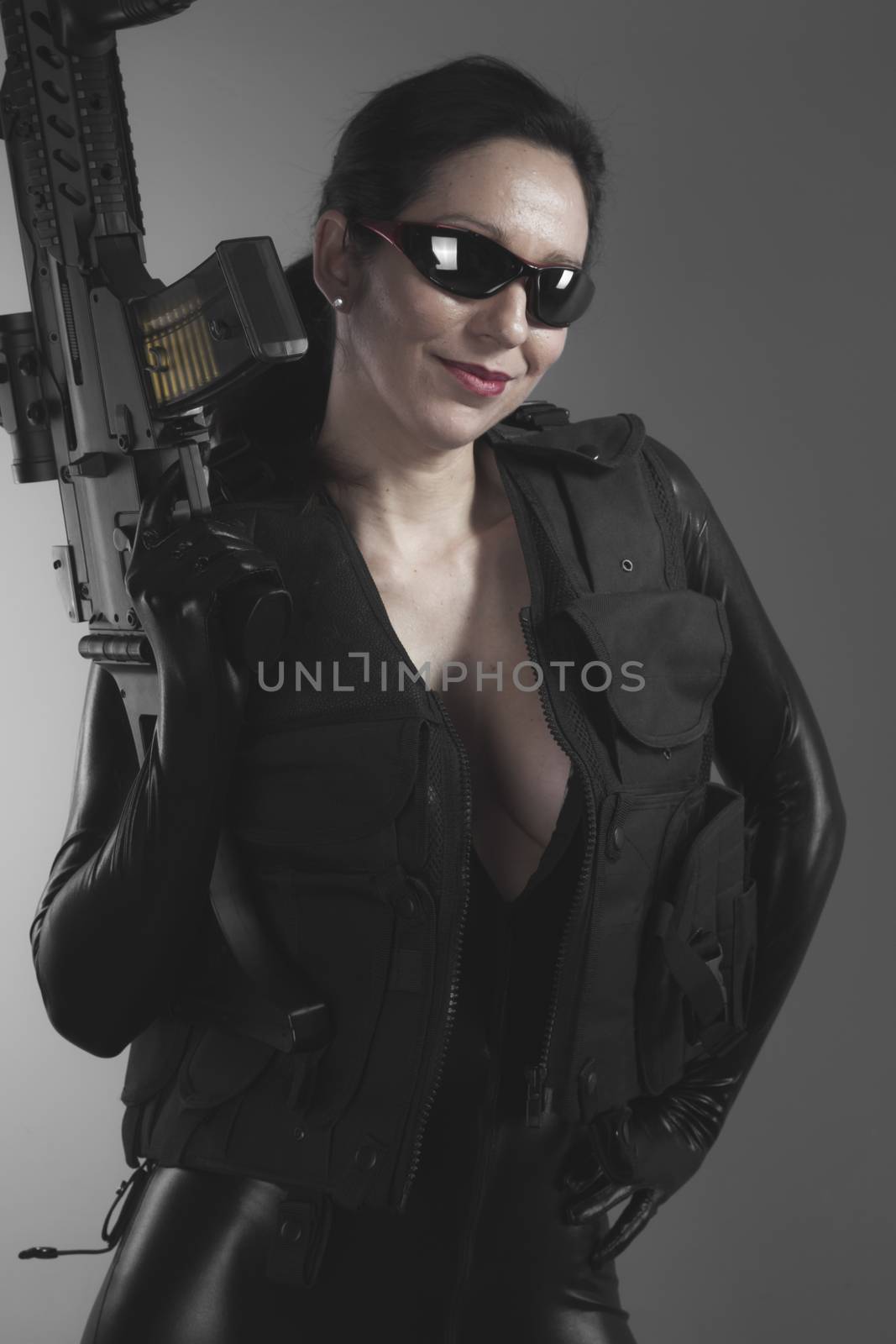 Costume, Brunette woman with enormous bulletproof vest and gun by FernandoCortes