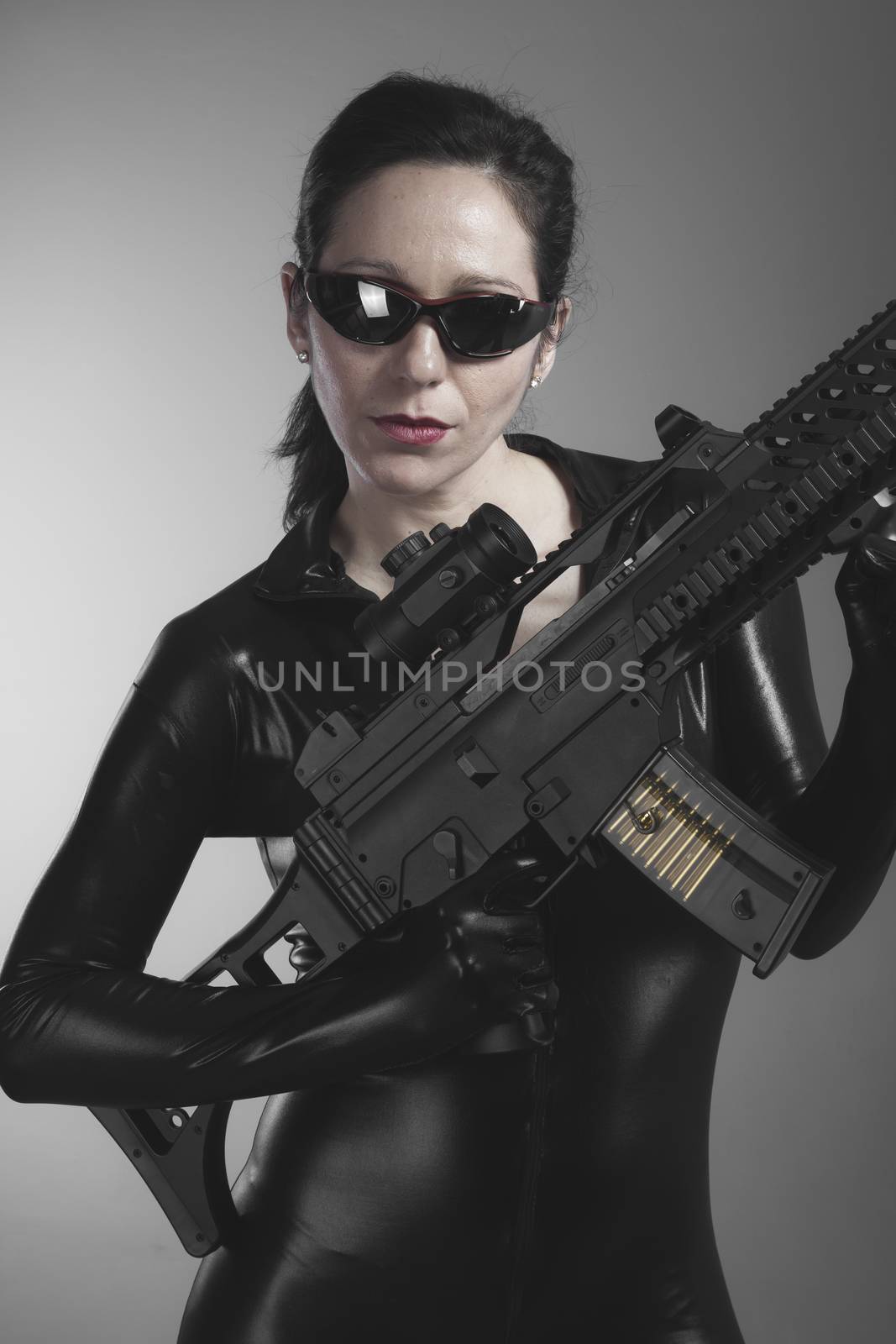 Raider, Brunette woman with enormous bulletproof vest and gun