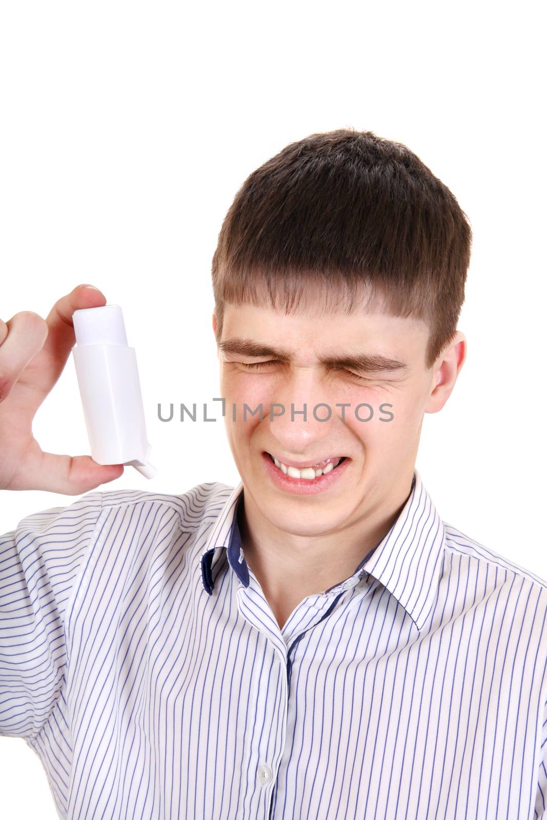 Dissatisfied Teenager using Inhaler Isolated on the White Background