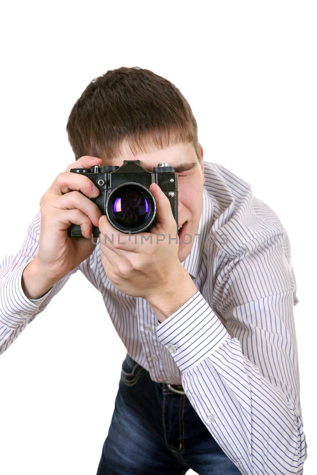 Young Man Take a Picture with Vintage Photo Camera Isolated on the White Background