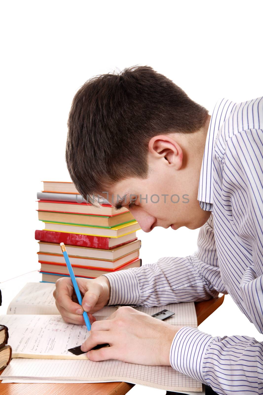 Student preparing for Exam at the School Desk