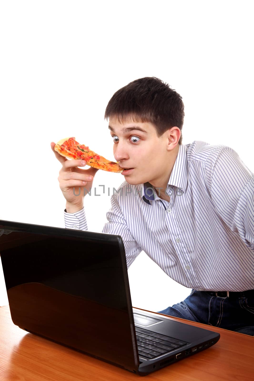 Surprised Teenager with Laptop and Pizza in the Mouth Isolated on the White