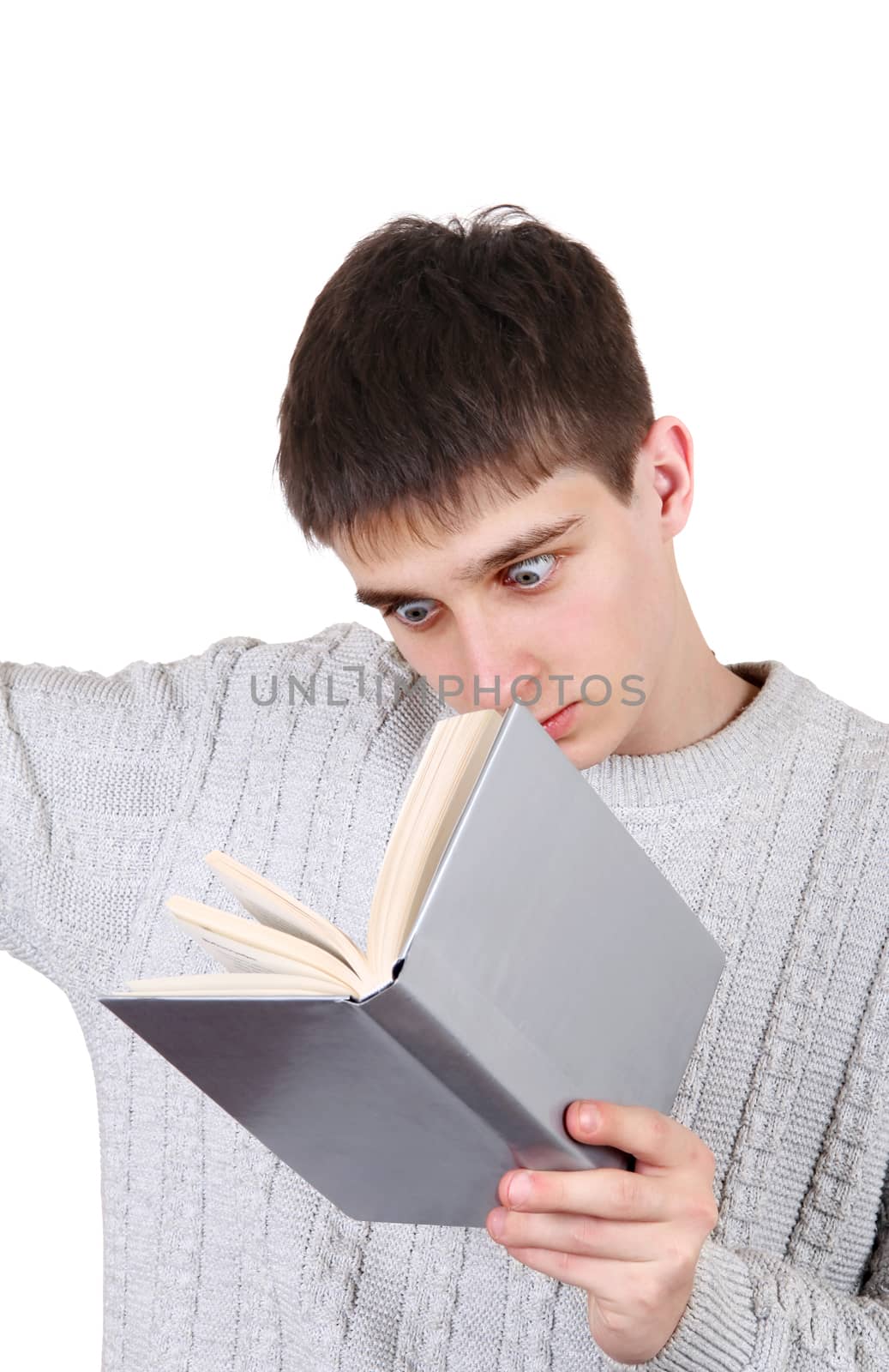 Surprised Teenager with a Book Isolated on the White Background