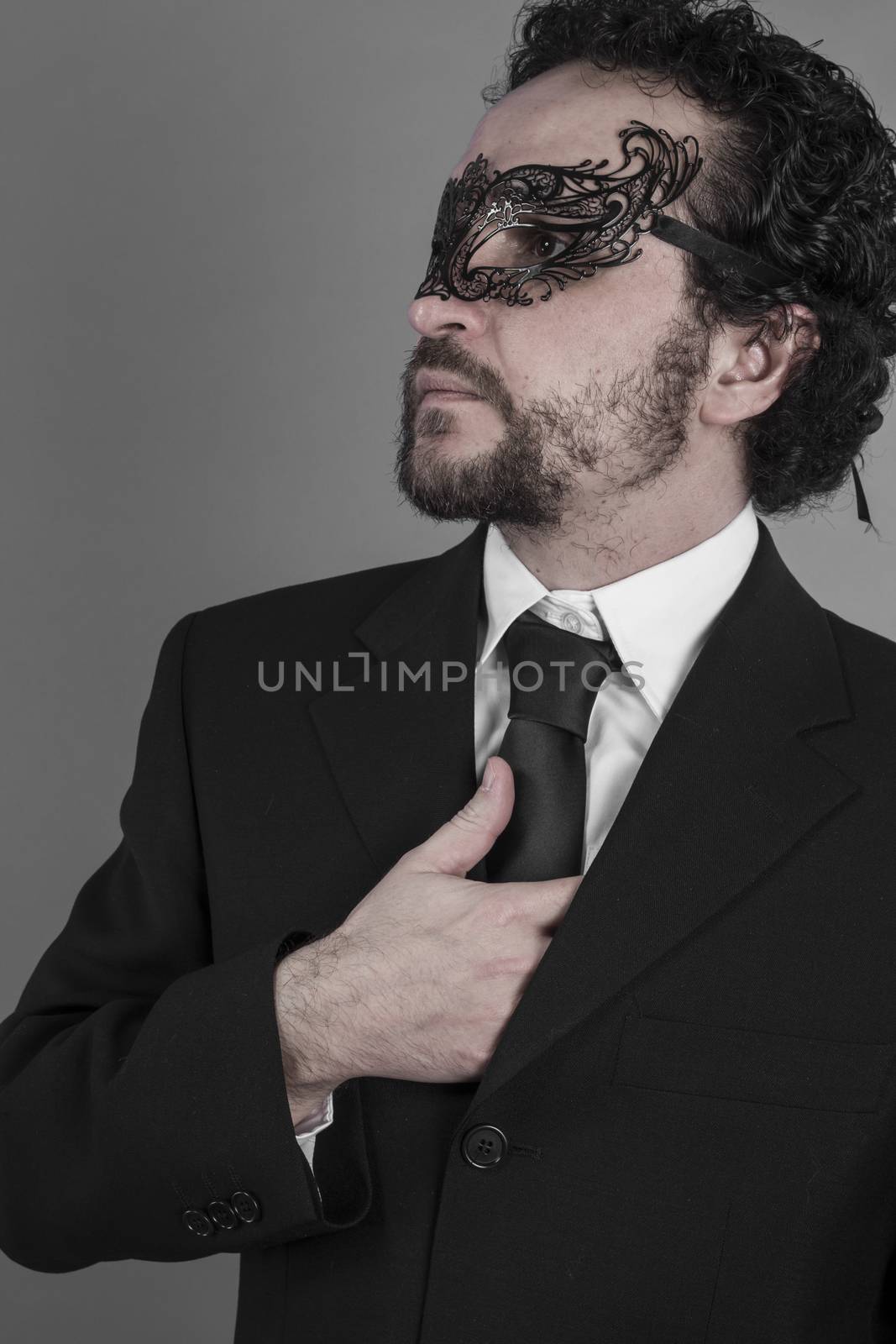 Handsome, Sexy and mysterious businessman with mask