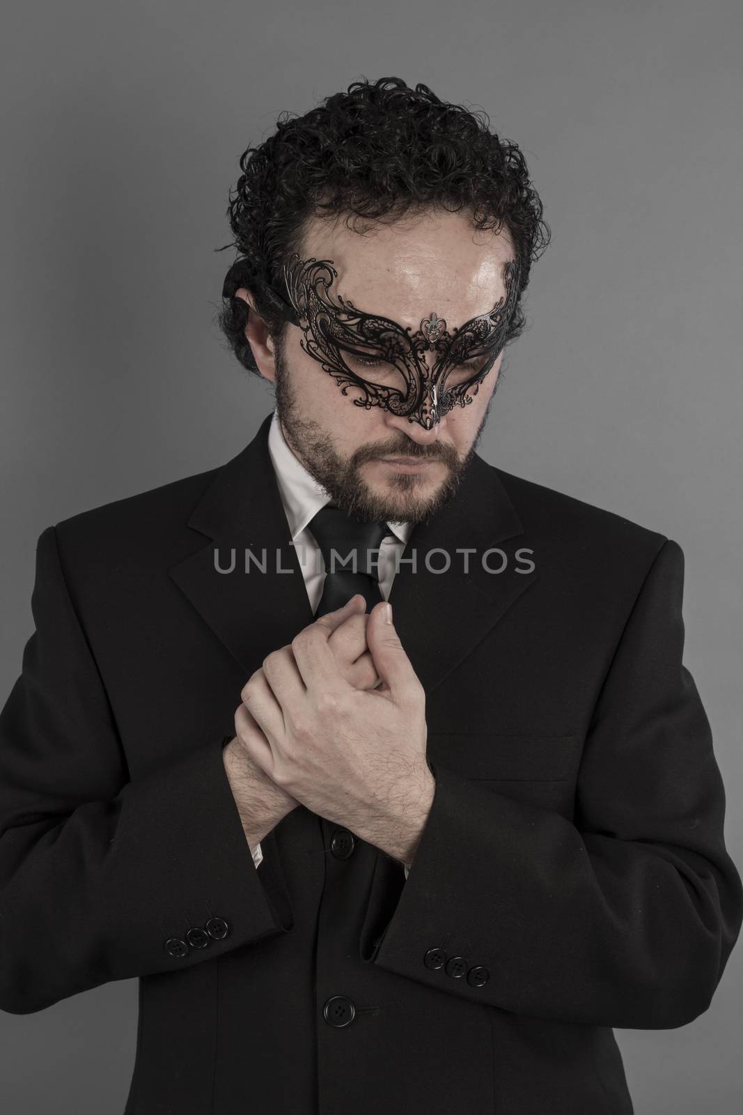 Corporate, Sexy and mysterious businessman with mask by FernandoCortes