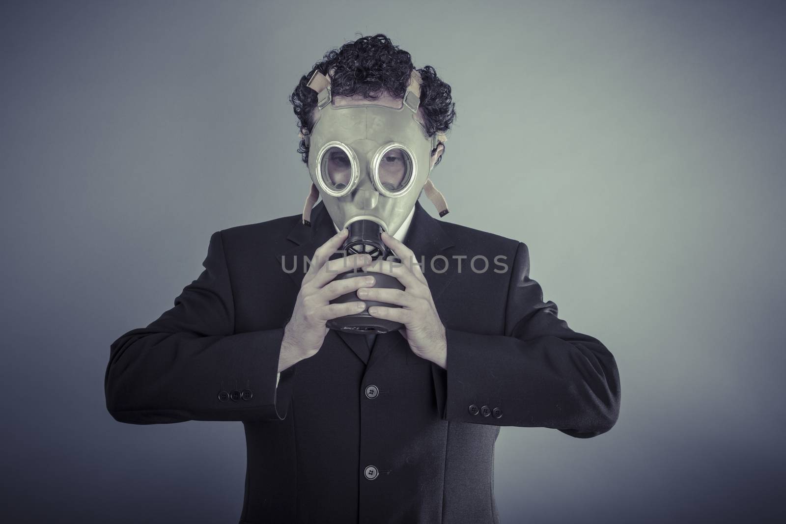 Disaster, Business man wearing a gask mask, pollution concept