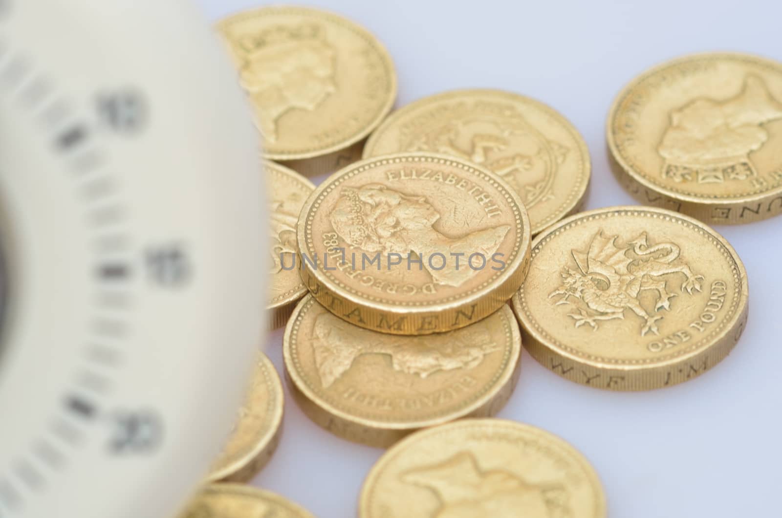 blurred timer and coins by pauws99