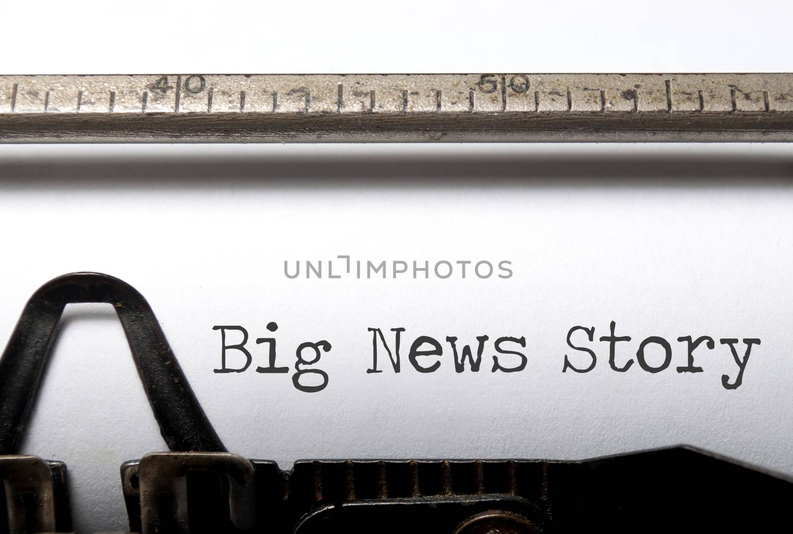 Old typewriter with big news story heading