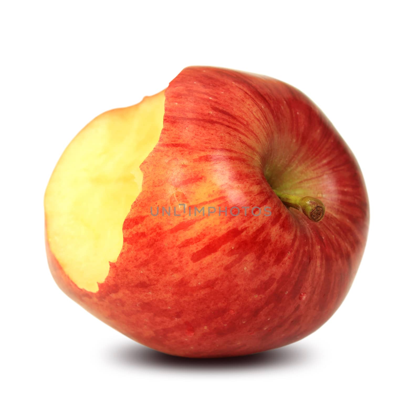 Bitten red apple isolated on white