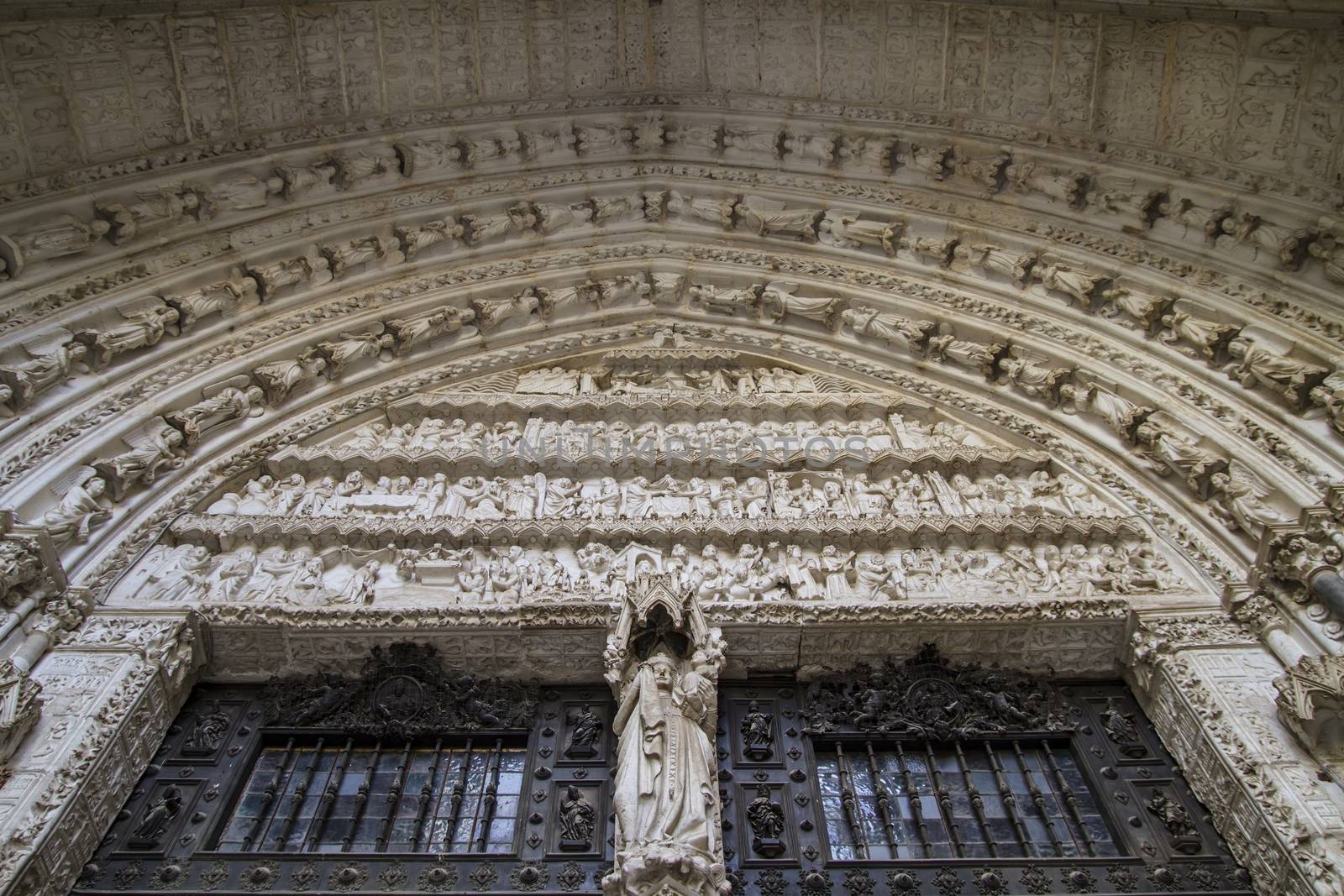 side entrance of the Cathedral of Toledo, arc with religious rel by FernandoCortes