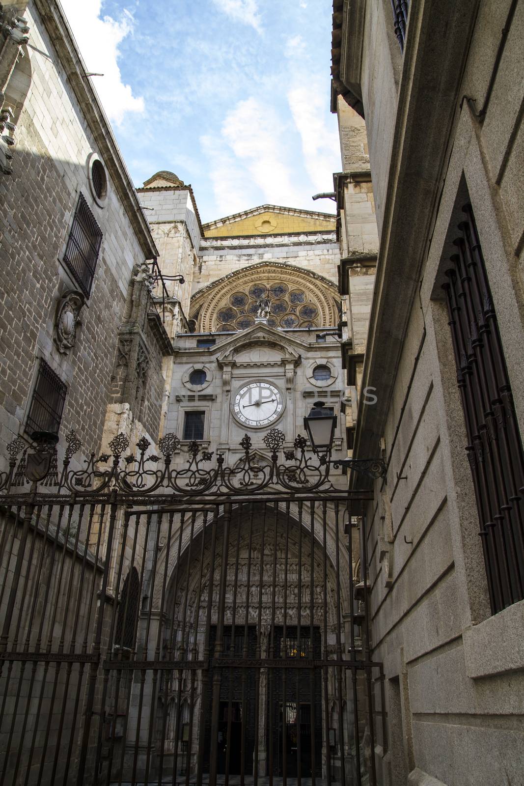 side entrance of the Cathedral of Toledo, arc with religious rel by FernandoCortes