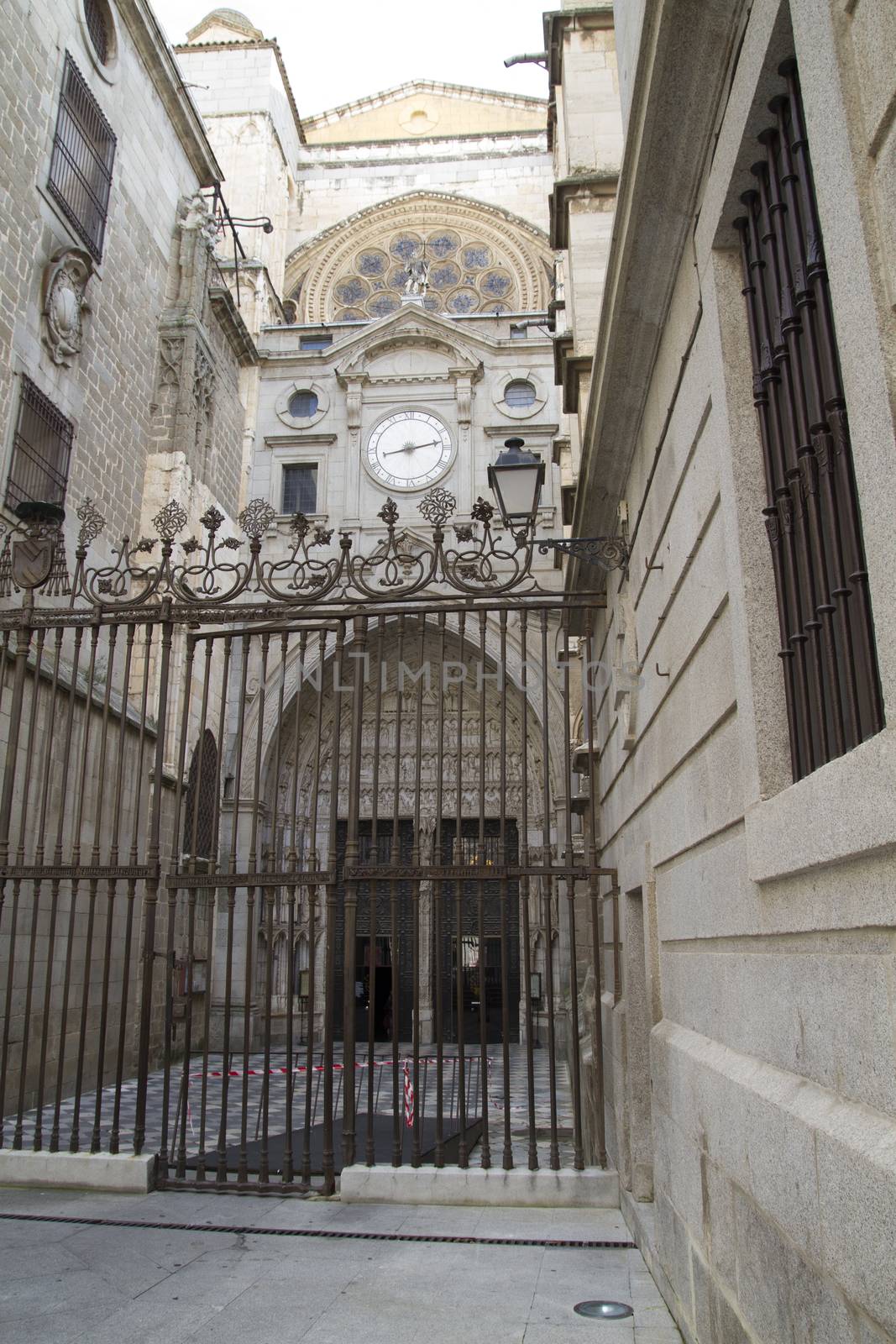 side entrance of the Cathedral of Toledo, arc with religious rel by FernandoCortes