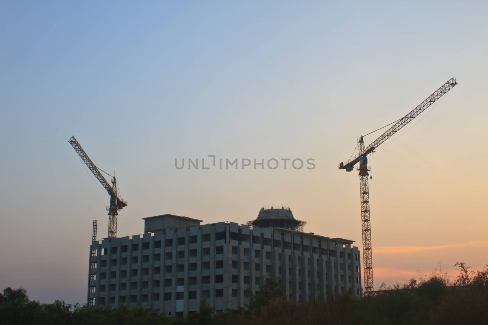 Construction site on sunset background