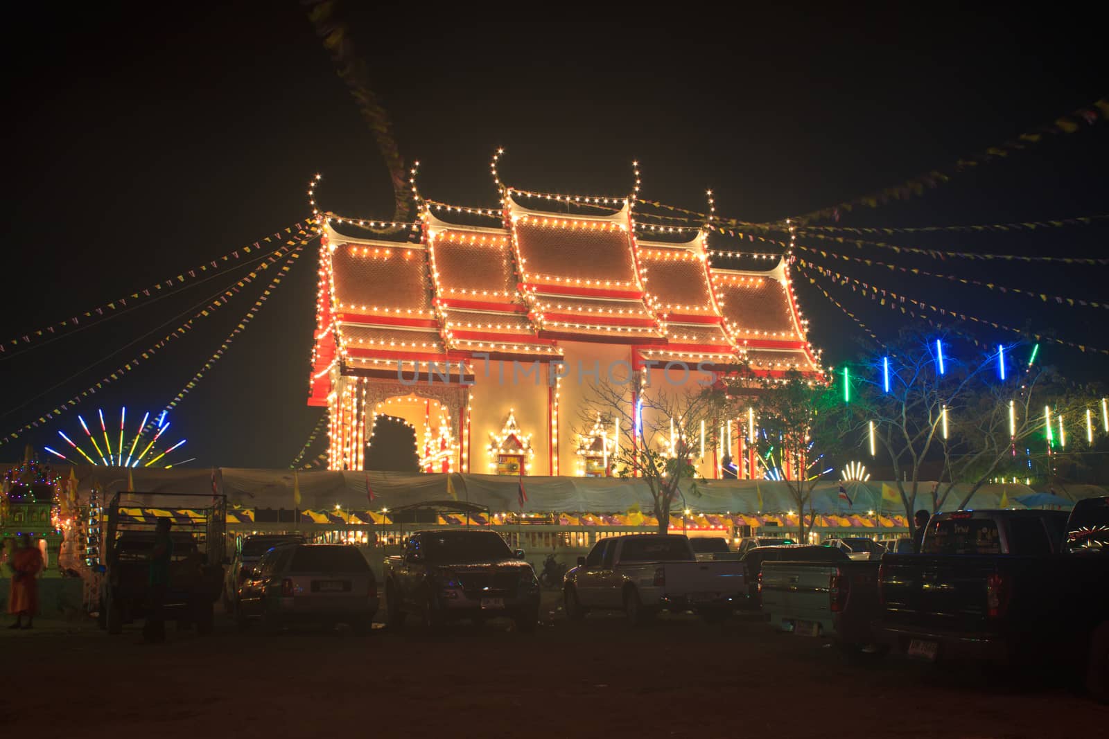 Pagodas and churches at the night in the temple fair,Thailand