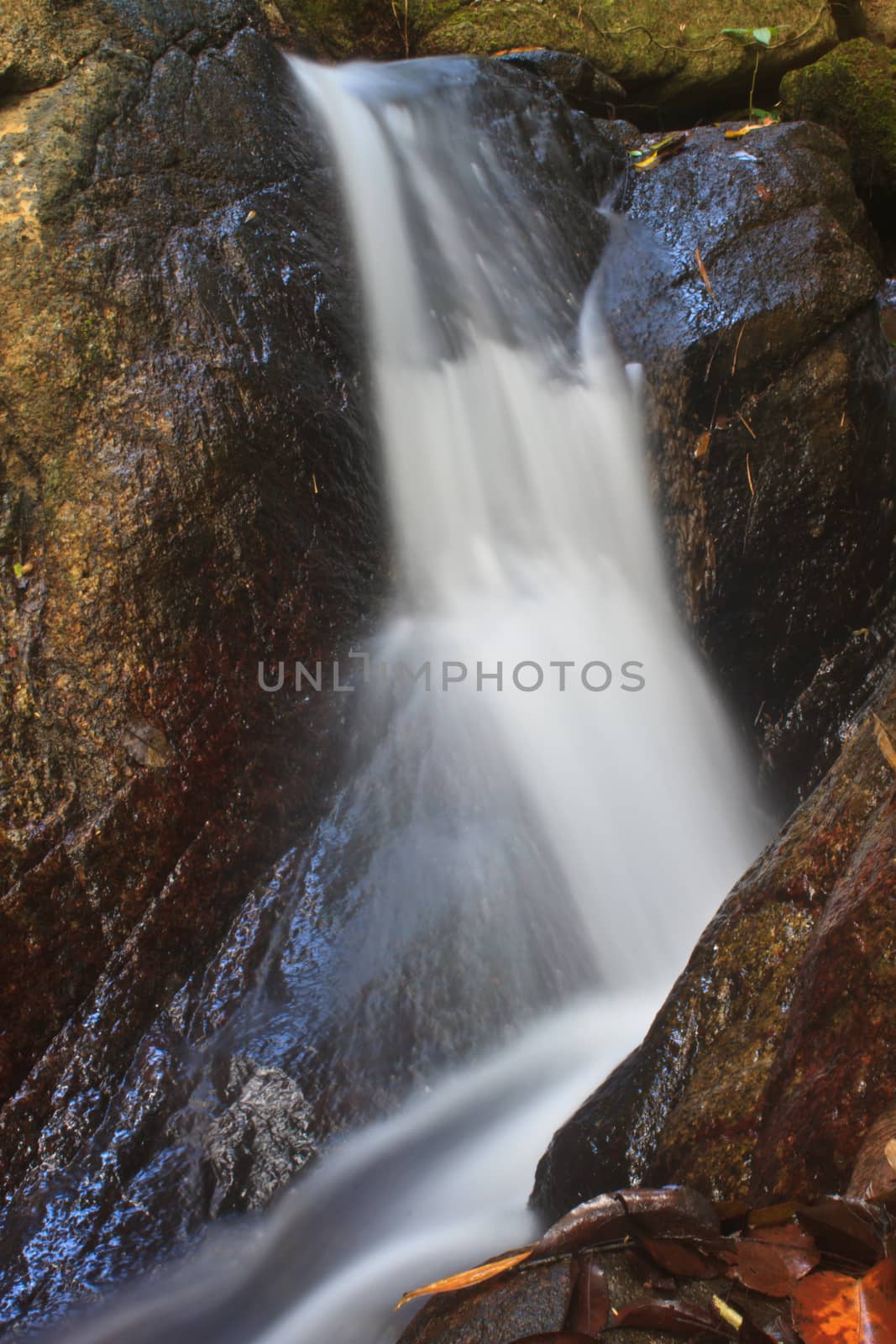 Nature waterfall in deep forest, in national park Thailand