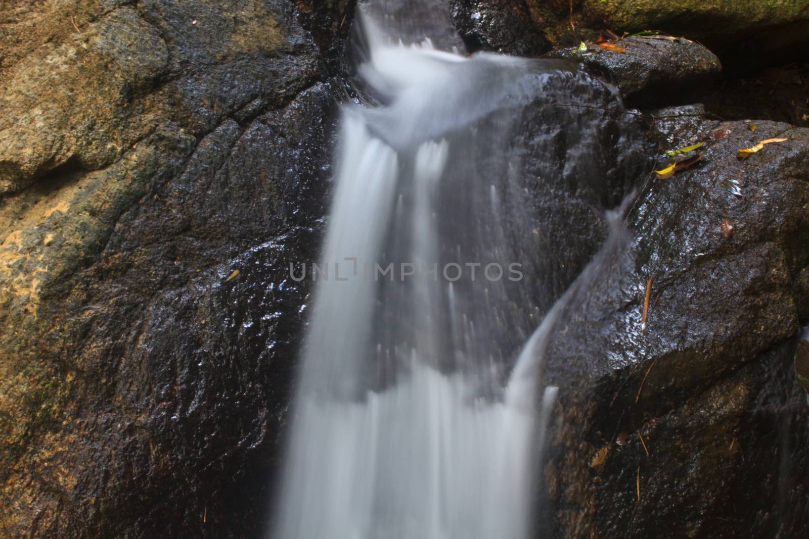 Nature waterfall in deep forest, in national park Thailand